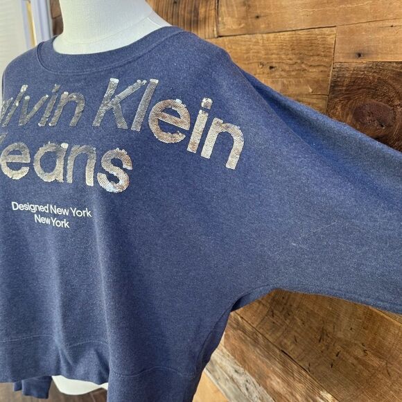 Calvin Klein Jeans Blue Sequin Logo Graphic Cropped sweatshirt sz L EUC - Picture 2 of 10